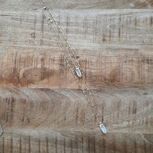 Tri strand gold necklace with crystal charms